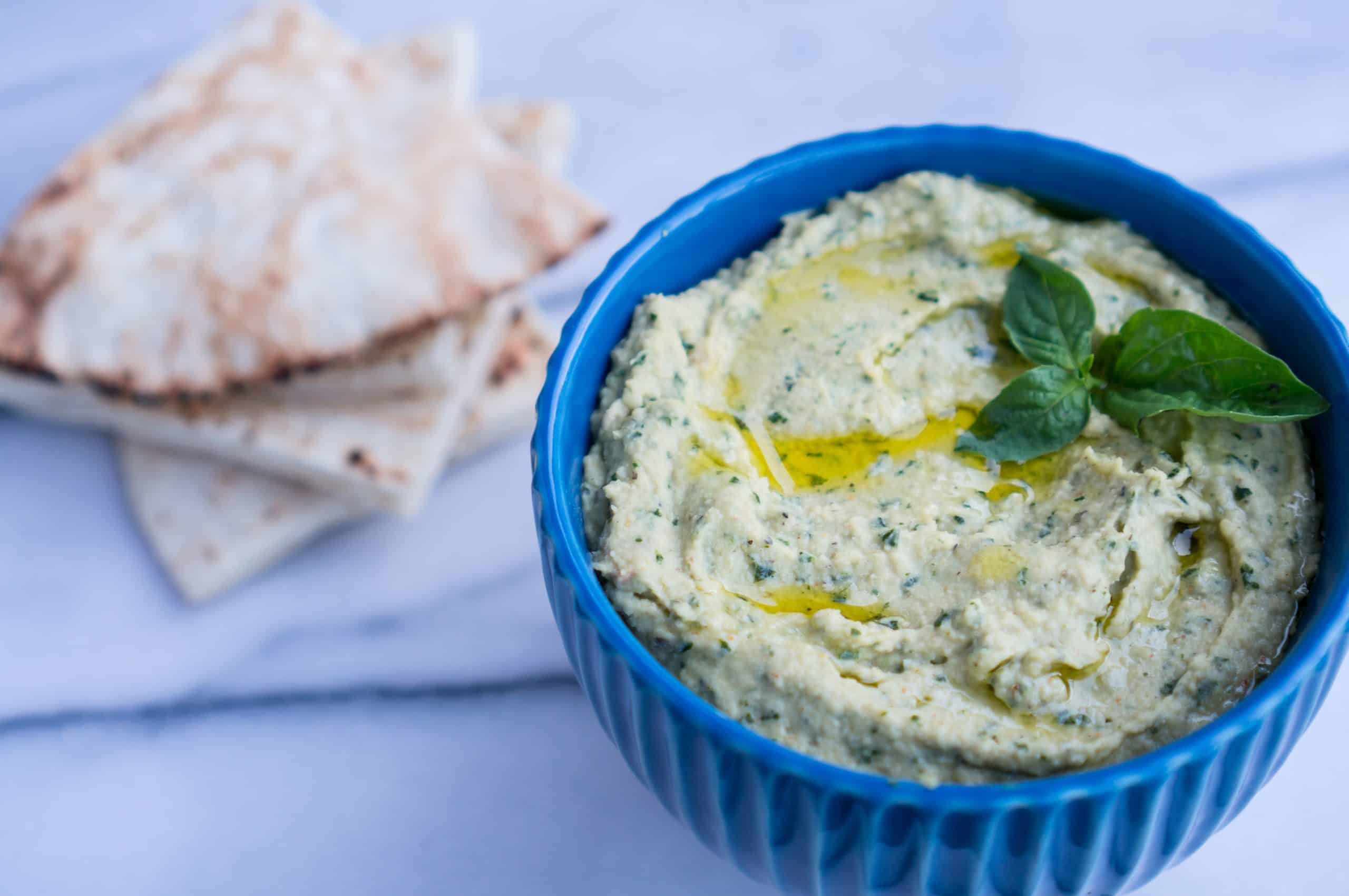 Lemon Basil Hummus – Simple recipe for healthy, homemade Lemon Basil Hummus! Just blend chickpeas, creamy tahini, fresh basil leaves, lemon juice, extra virgin olive oil, and garlic ♥ We can’t stop snacking on this smooth, dreamy, creamy vegan dip! | freeyourfork.com