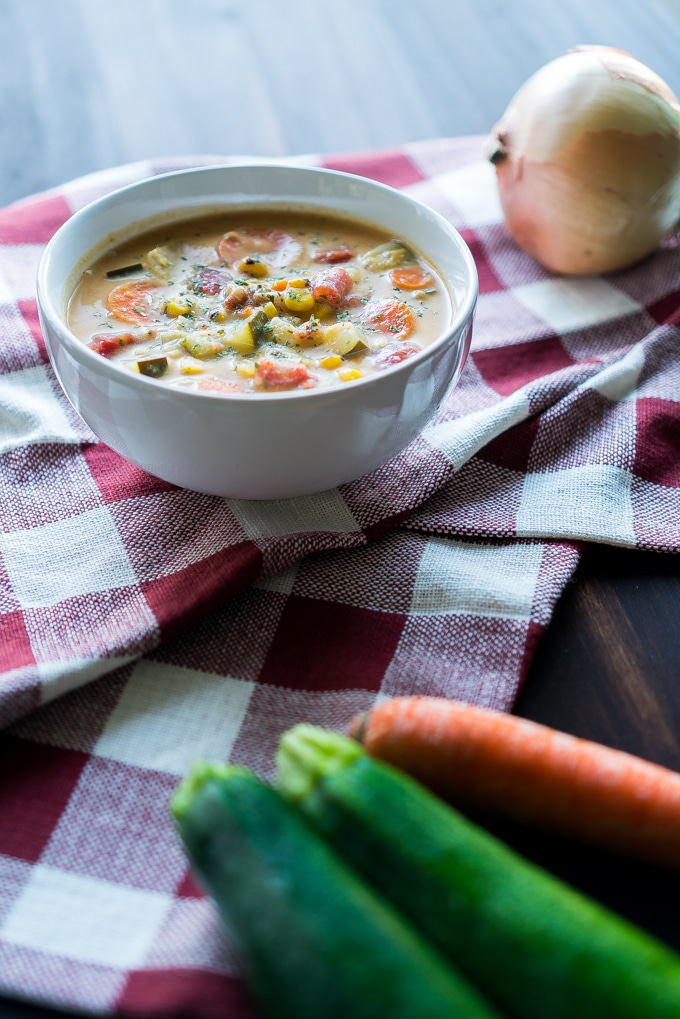 Creamy Vegetable Soup – Healthy recipe for Creamy Vegetable Soup! Uses zucchini, broccoli stalks, carrots, corn, tomatoes, and more. We love that this recipe is gluten-free, dairy-free, and potato-free with options to make it vegetarian/vegan friendly!♥ | freeyourfork.com