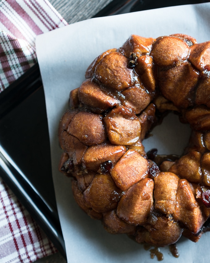 Brie Stuffed Monkey Bread - Easy recipe for Brie Stuffed Monkey Bread! This semi-homemade dessert uses ready-to-bake biscuit dough, brie, cranberry sauce (or jam), dried cranberries, brown sugar, & spices. A fun & simple recipe to make with friends! ♥ | freeyourfork.com