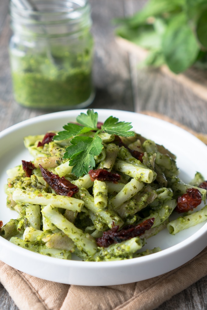 Spicy Green Pesto - Healthy recipe for Spicy Green Pesto! Vegan, gluten-free, & ready in 10 minutes. Uses baby kale, fresh basil, serrano peppers, garlic, almonds, lemon juice & olive oil. Perfect for sprucing up pasta, macro-bowls, flatbreads, or morning eggs! ♥ | freeyourfork.com