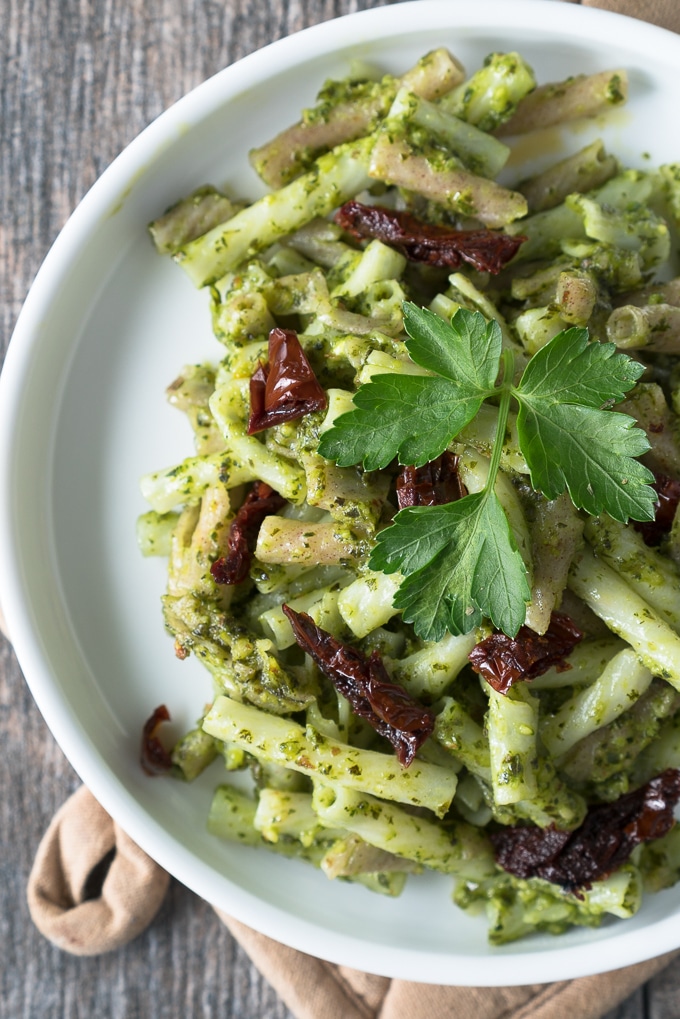 Spicy Green Pesto - Healthy recipe for Spicy Green Pesto! Vegan, gluten-free, & ready in 10 minutes. Uses baby kale, fresh basil, serrano peppers, garlic, almonds, lemon juice & olive oil. Perfect for sprucing up pasta, macro-bowls, flatbreads, or morning eggs! ♥ | freeyourfork.com