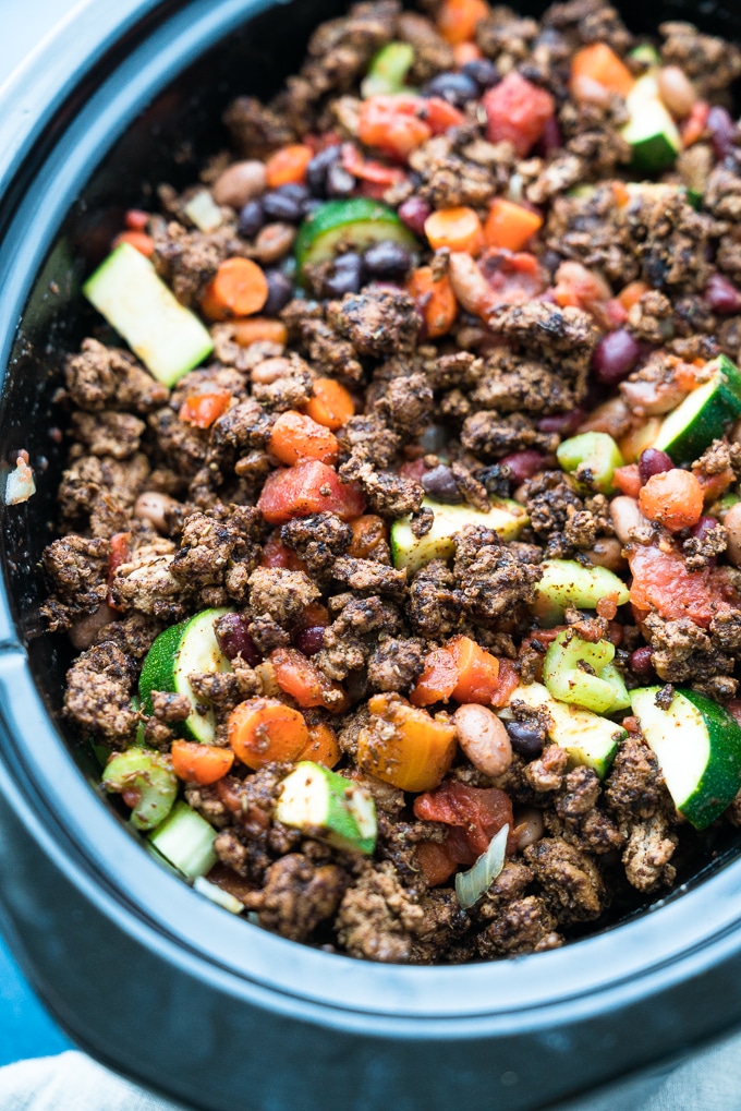 3-Bean Slow Cooker Turkey Chili - Healthy recipe for 3-Bean Slow Cooker Turkey Chili! Using fresh vegetables, canned beans, lean ground turkey, and savory spices. Gluten free & high-protein! freeyourfork.com