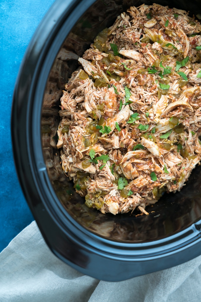 Crockpot Salsa Chciken – Healthy + meal-prep friendly recipe for Crockpot Salsa Chicken! This 2-ingredient shredded chicken is perfect for using in enchiladas, tacos, burrito bowls, soups, casseroles, and more! ♥ | freeyourfork.com