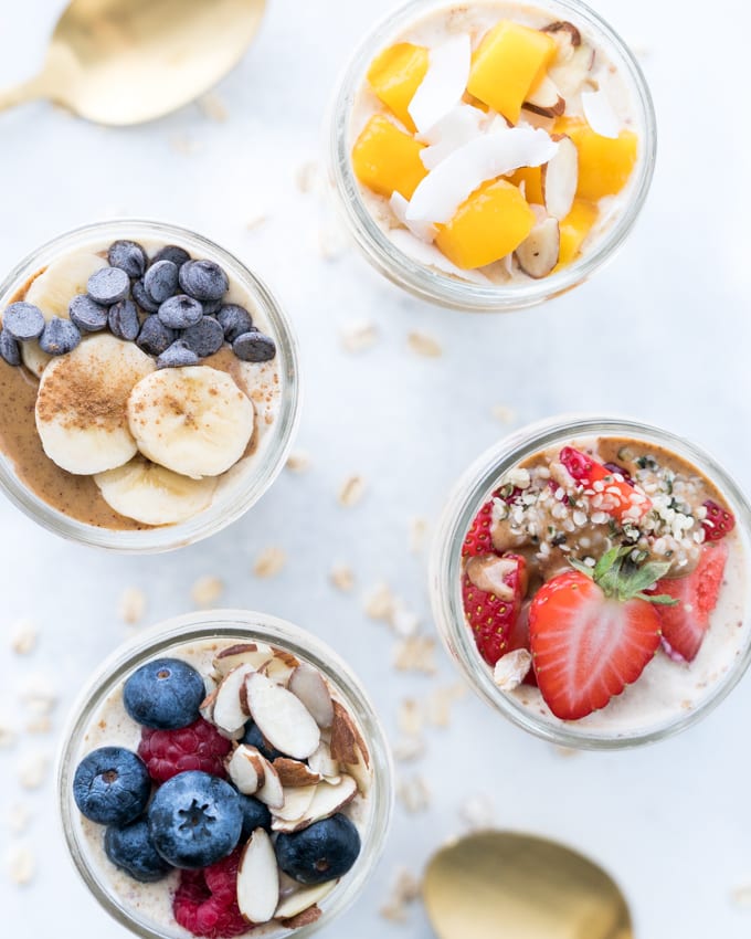 Easy Overnight Oats - Healthy recipe that can be used with countless toppings and flavor combinations! Made using rolled oats, Greek yogurt, almond milk, coconut nectar, vanilla, and cinnamon. With instructions for turning this single serving into a 4-Day Breakfast Meal Prep! ♥ | freeyourfork.com