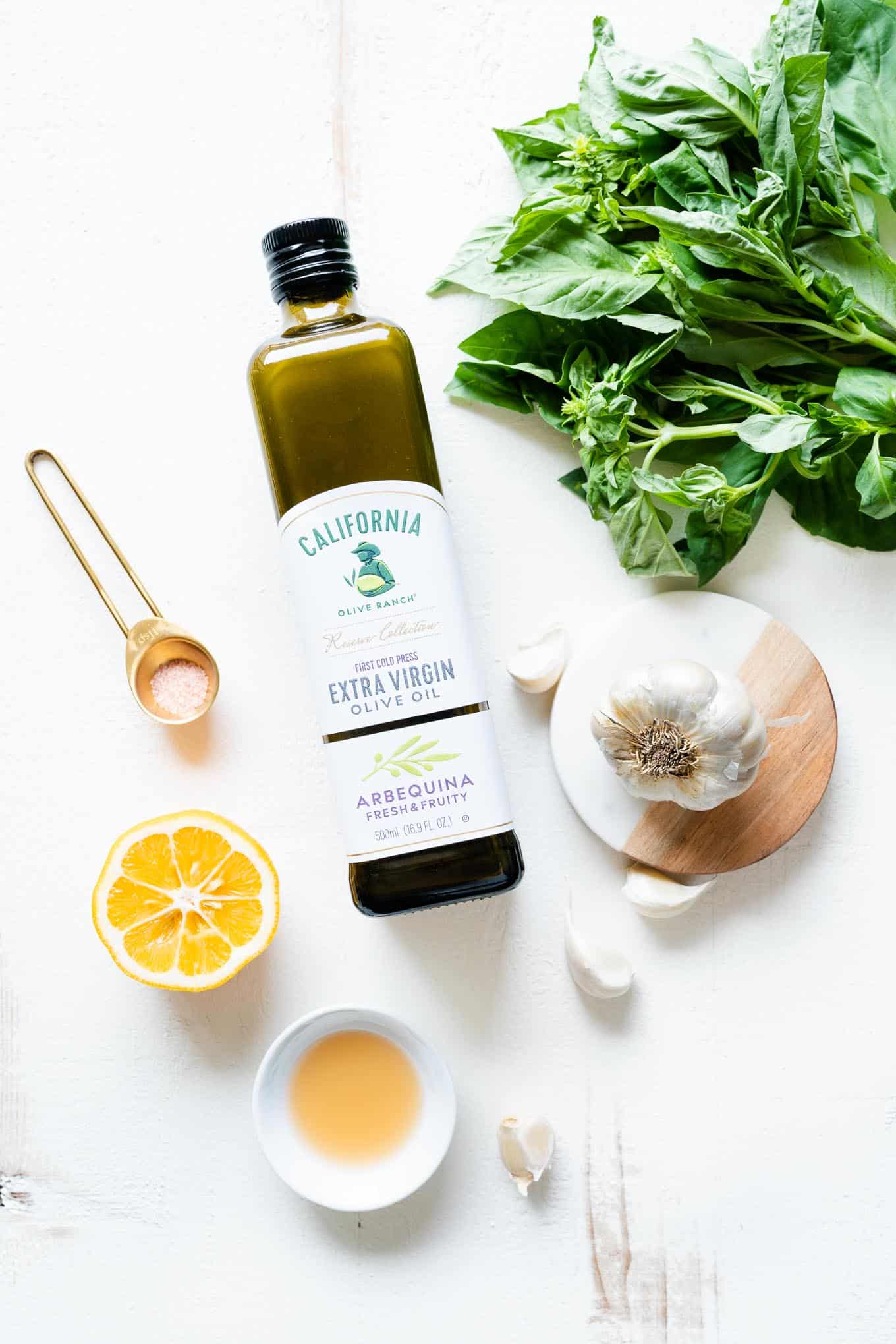 olive oil lemon garlic and apple cider vinegar with fresh basil