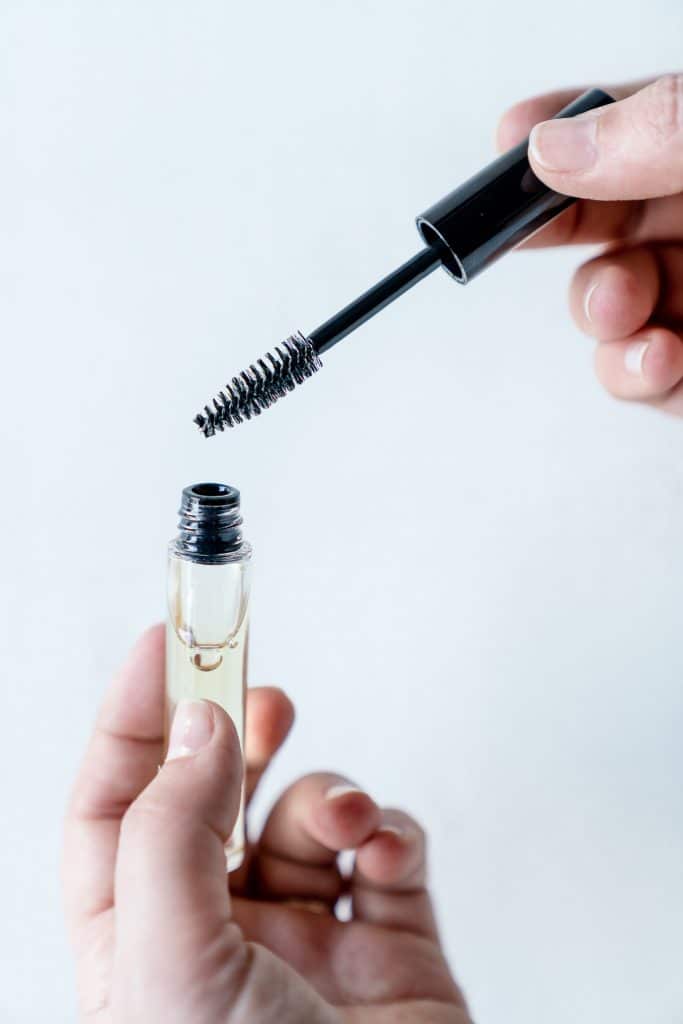 diy brow and lash serum shown in mascara tube with wand